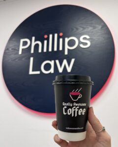 Phillips Law sign and Really awesome coffee branded cup for Brew Monday