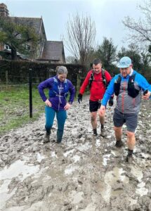 Muddy challenge, Lisa and two others stuck in the mud