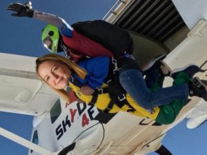 Kate Atkinson photoshopped on a skydiver.