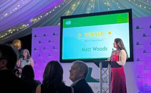 Lisa Perry announcing Matt Woods as the winner